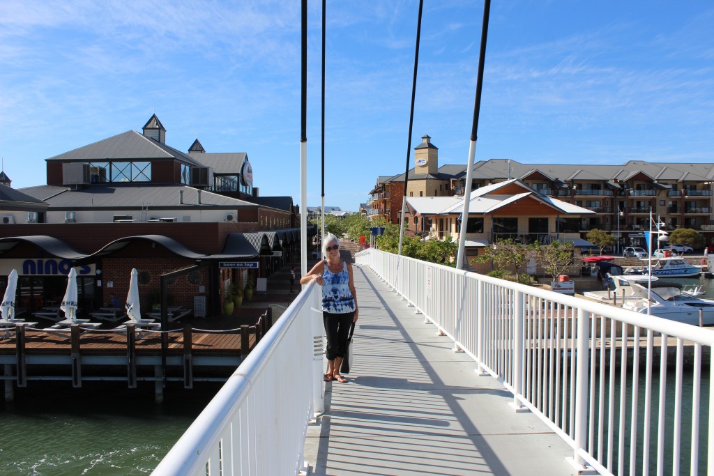 Janis on the foot bridge to Dolphin Quay.