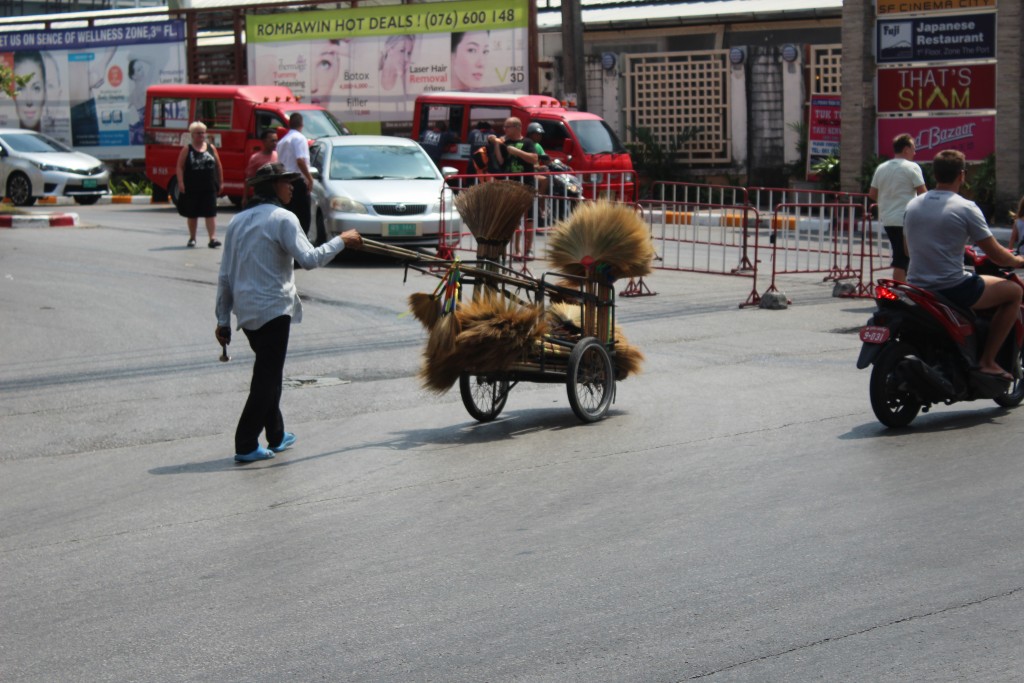 I thought this broom seller was kind of interesting.