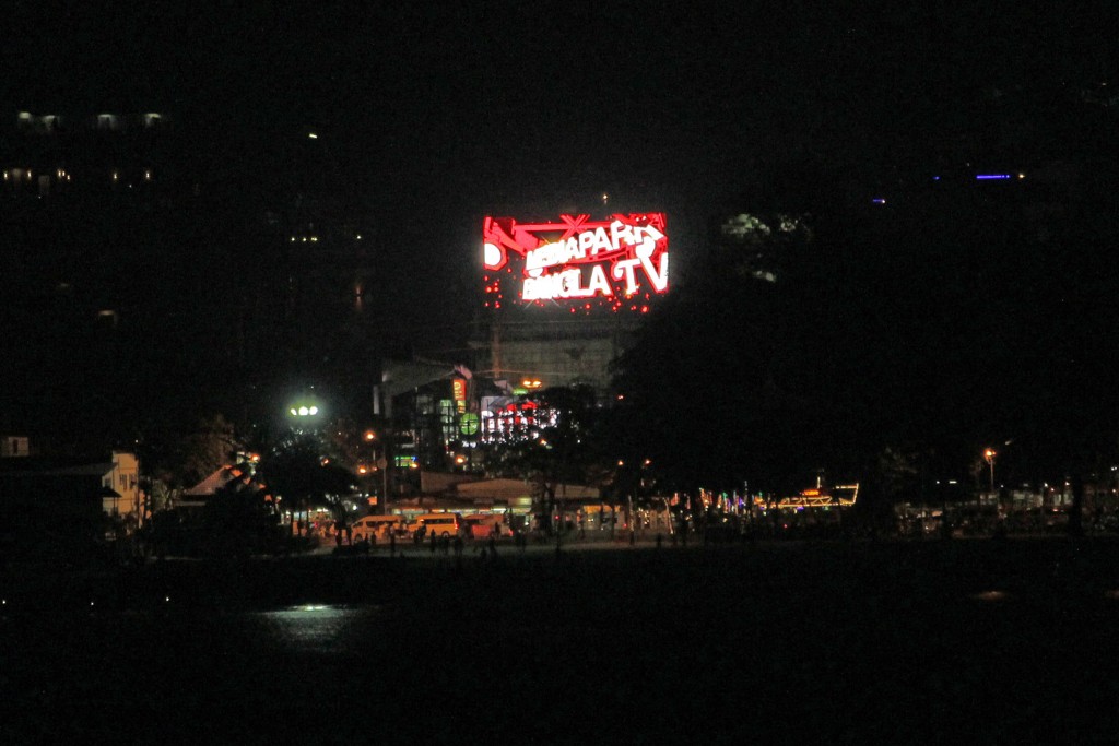 Giant LED screen in the Patong night time skyline.