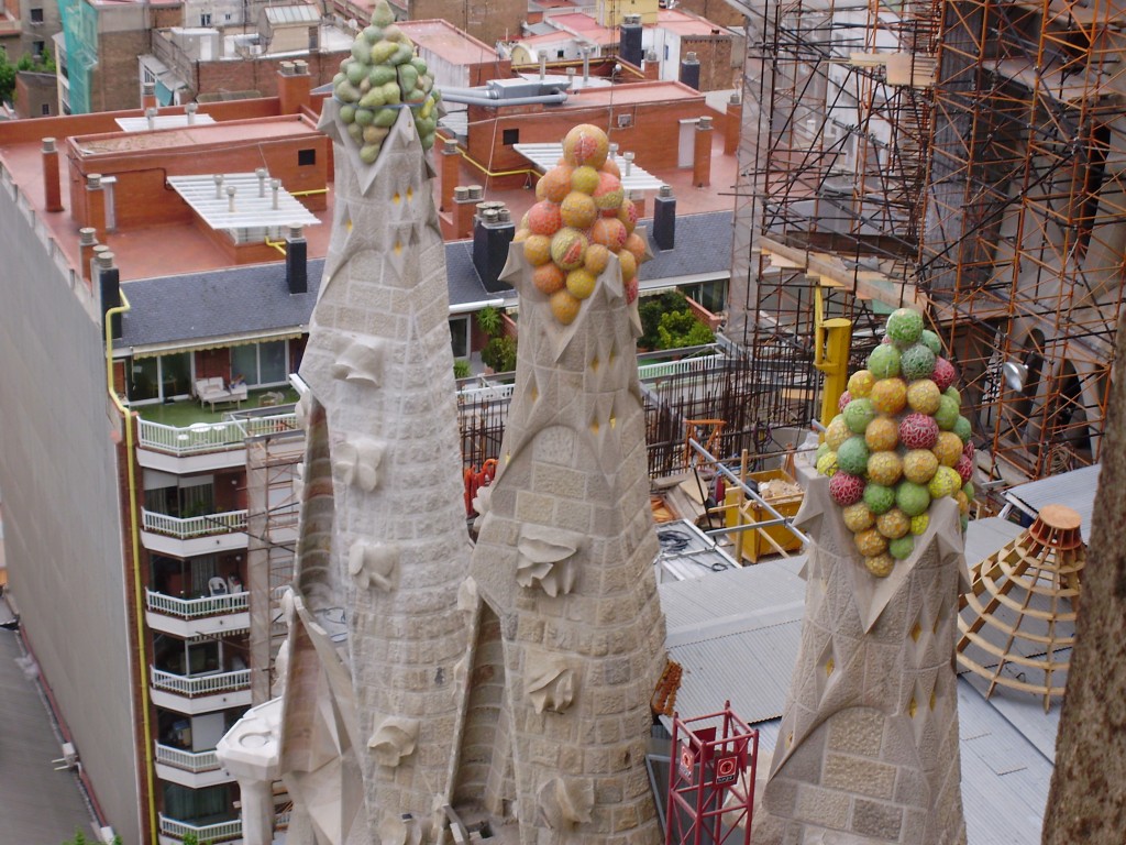 Heaps of fruit atop some pinnacles at the Sagrada Familia