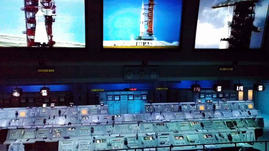Three screens showed the Apollo 8 Moon Launch above the actual control room used for the launch.