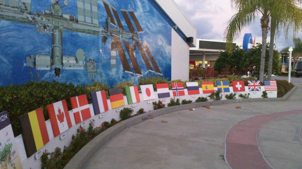 The International Space Station mural and flags of participant countries.