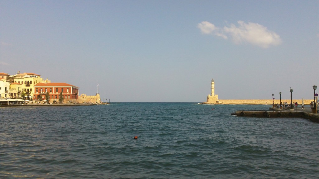 The bay is accessed by a narrow gap between the western end of the bay and the lighthouse.