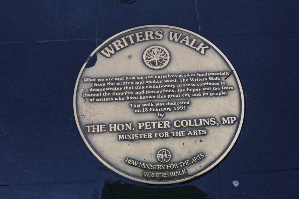 The center plaque for the Writers Walk tells about this project.