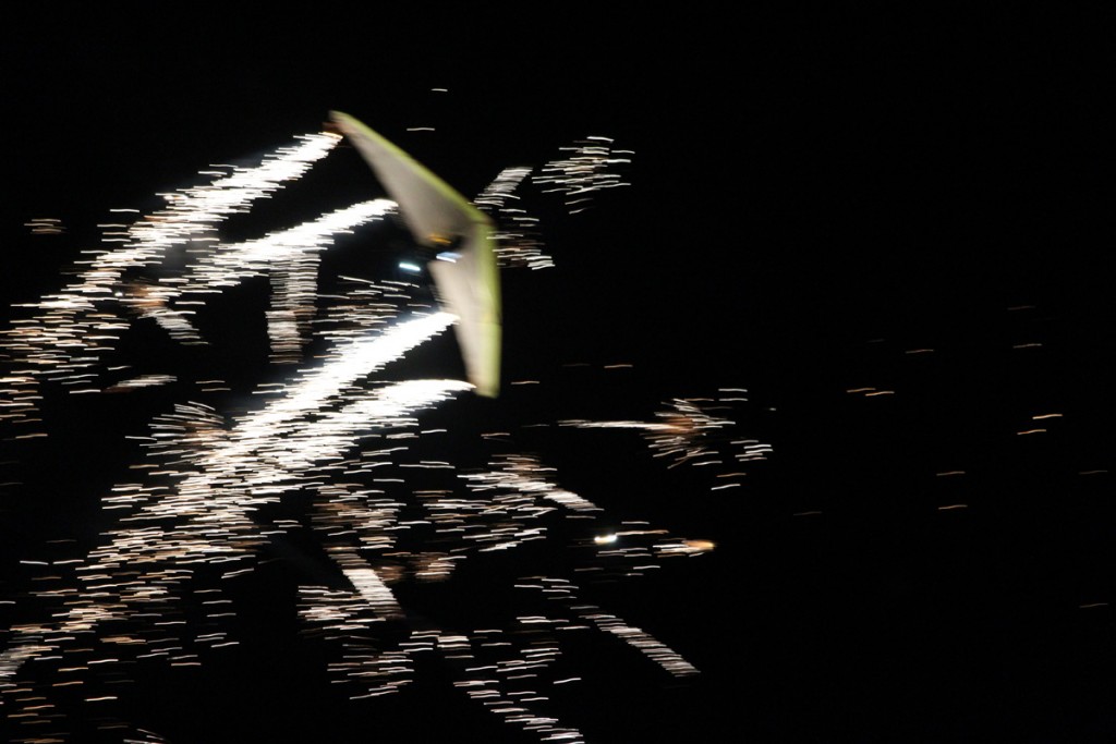 Dan's hang glider shot out fireworks as well as trailed them behind