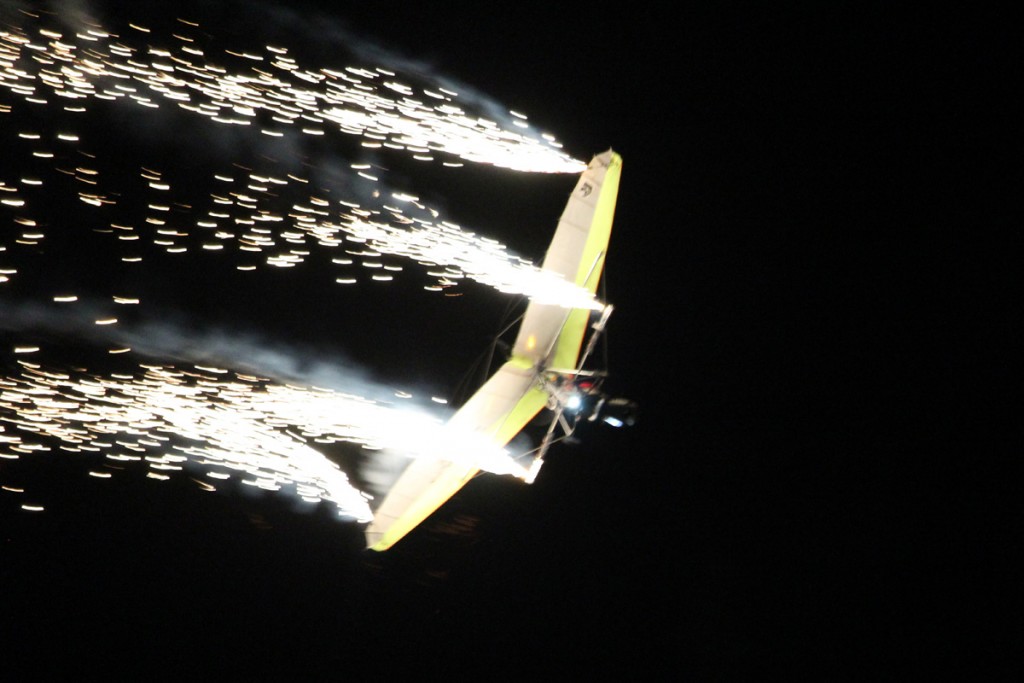 Dan Buchanon's night time hang glider flight was a fireworks extravaganza. 